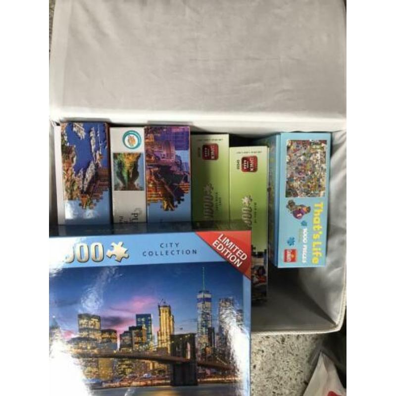 7 x 1000 stukjes puzzel en 1 x 2000 stukjes