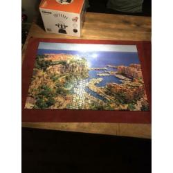 7 x 1000 stukjes puzzel en 1 x 2000 stukjes