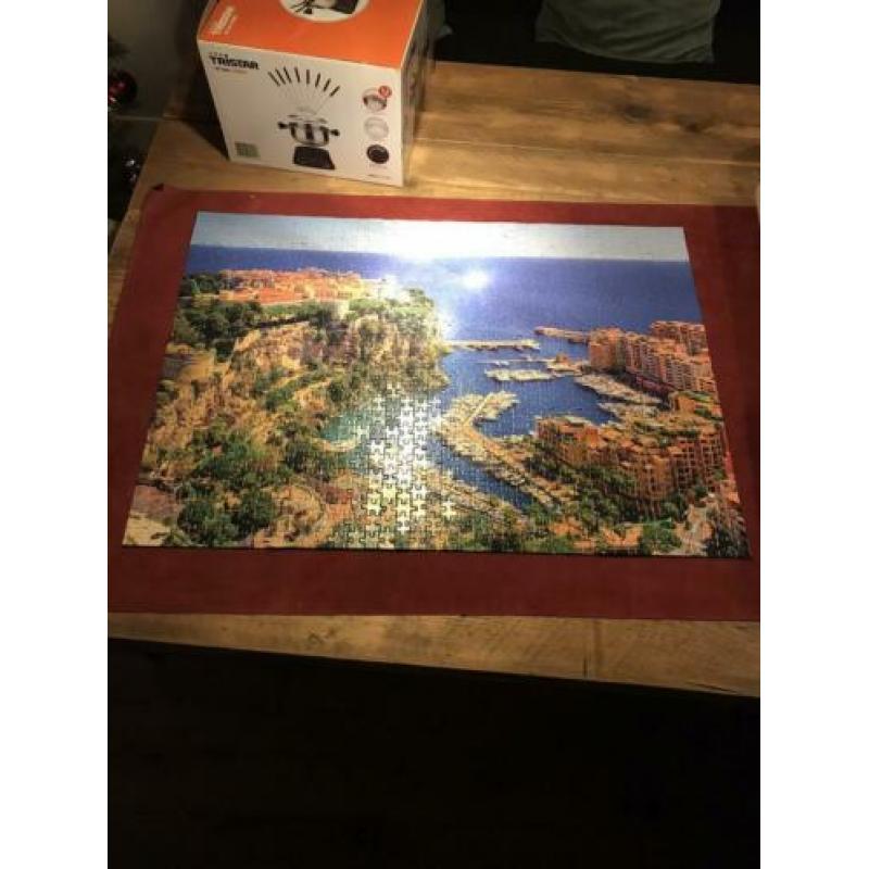 7 x 1000 stukjes puzzel en 1 x 2000 stukjes